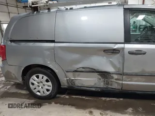 2014 Ram Cargo Van with VIN 2C4RRGAG9ER312915, listed as a IAAI auction lot 41947886 with 149,144 mi miles and . Bid and sale history available at DreamBid. Image 6.