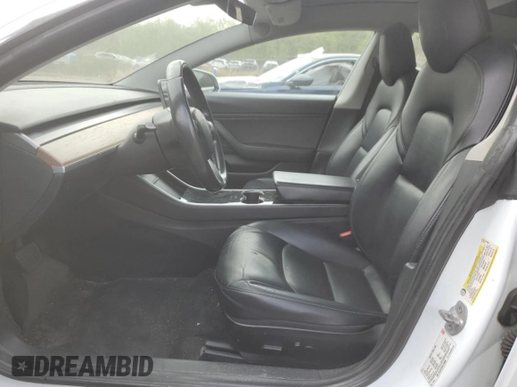 2018 Tesla Model 3 Long Range Battery with VIN 5YJ3E1EAXJF165000, listed as a Copart auction lot 53806195 with 140,448 mi miles and Clean Title. Bid and sale history available at DreamBid. Image 7.