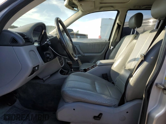 2000 Mercedes-Benz M 320/430/500 with VIN 4JGAB72E2YA185234, listed as a Copart auction lot 83479684 with 209,491 mi miles and Clean title. Bid and sale history available at DreamBid. Image 7.