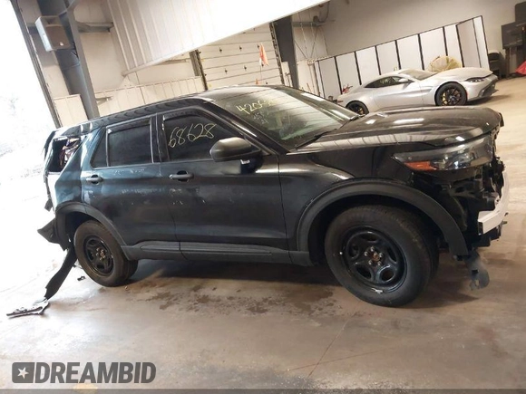 2023 Ford Police Interceptor Utility z VIN 1FM5K8AB1PGA03761, wystawiony jako IAAI lot #42068628 z przebiegiem 39 009 mil mil oraz . Historia ofert i sprzedaży dostępna na DreamBid. Obrazek 1.