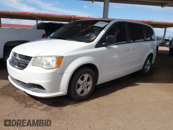 2012 Dodge Grand Caravan SE with VIN 2C4RDGBGXCR407641, listed as a IAAI auction lot 41950812 with 151,331 mi miles and . Bid and sale history available at DreamBid. Image 2.