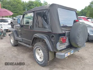 2001 Jeep Wrangler Sahara with VIN 1J4FA59S41P358035, listed as a IAAI auction lot 42685488 with 120,630 mi miles and . Bid and sale history available at DreamBid. Image 3.