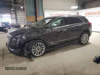 2019 Cadillac XT5 Platinum AWD z VIN 1GYKNGRS2KZ166147, wystawiony jako Copart lot #59977015 z przebiegiem 14 706 mil mil oraz Szkoda całkowita • Salvage title. Historia ofert i sprzedaży dostępna na DreamBid. Obrazek 1.