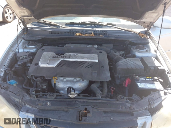 2005 Kia Spectra LX with VIN KNAFE121955107403, listed as a IAAI auction lot 42055036 with 157,605 mi miles. Bid and sale history available at carsss.com. Image 10.