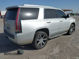 2016 Cadillac Escalade Luxury Collection z VIN 1GYS4BKJ7GR315425, wystawiony jako IAAI lot #41835277 z przebiegiem 176 753 mil mil oraz . Historia ofert i sprzedaży dostępna na DreamBid. Obrazek 4.