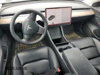 2020 Tesla Model 3 Standard Range Plus z VIN 5YJ3E1EA1LF784832, wystawiony jako Copart lot #57912995 z przebiegiem 77 665 mil mil oraz Szkoda całkowita • Salvage title. Historia ofert i sprzedaży dostępna na DreamBid. Obrazek 8.