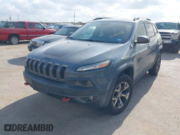 2014 Jeep Cherokee Trailhawk z VIN 1C4PJMBS2EW161276, wystawiony jako IAAI lot #42283358 z przebiegiem 135 201 mil mil oraz . Historia ofert i sprzedaży dostępna na DreamBid. Obrazek 17.