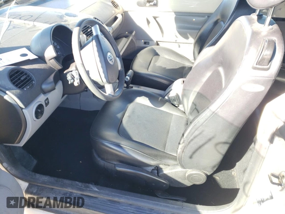 2005 Volkswagen Beetle with VIN 3VWCM21Y15M311018, listed as a Copart auction lot 77611914 with 187,498 mi miles and Salvage Title. Bid and sale history available at DreamBid. Image 7.