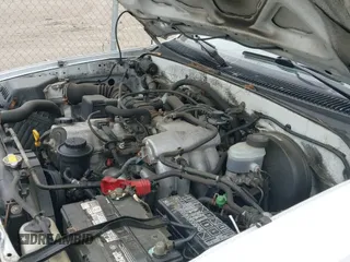 2002 Toyota Tacoma z VIN 5TEWM72N42Z044540, wystawiony jako IAAI lot #42923112 z przebiegiem 141 580 mil mil oraz . Historia ofert i sprzedaży dostępna na DreamBid. Obrazek 13.
