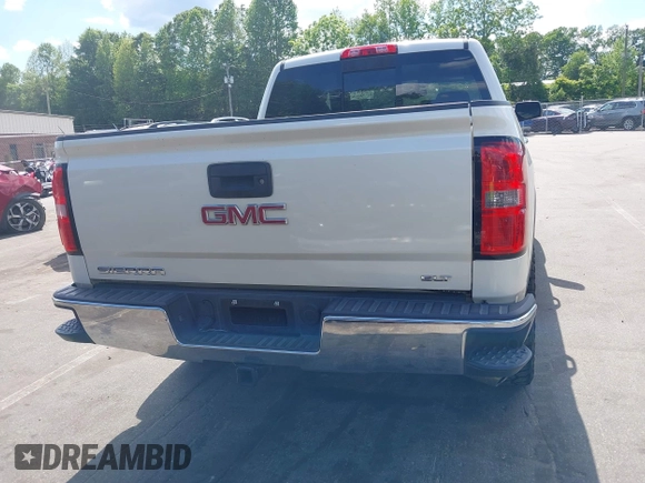 2014 GMC Sierra 1500 SLT with VIN 3GTU2VEC5EG548784, listed as a IAAI auction lot 42156738 with 118,809 mi miles and . Bid and sale history available at DreamBid. Image 16.
