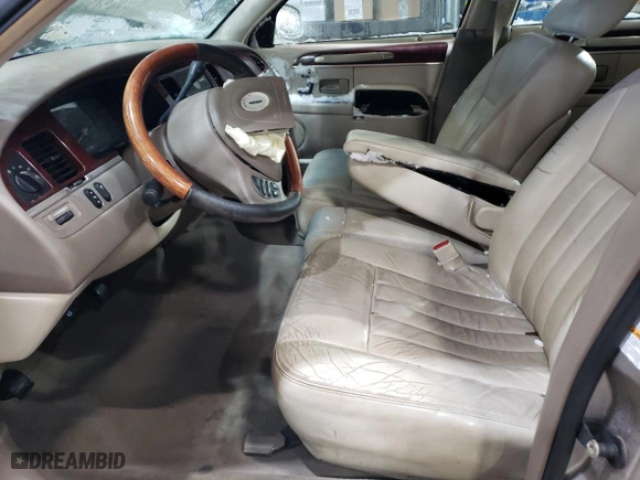 2003 Lincoln Town Car Signature with VIN 1LNHM82W73Y671609, listed as a Copart auction lot 88264385 with 0 mi miles and Salvage Title. Bid and sale history available at carsss.com. Image 7.