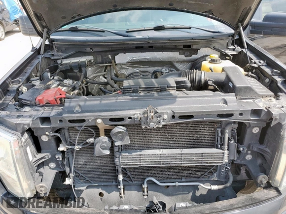 2014 Ford F-150 XL with VIN 1FTFX1CF0EFC92250, listed as a Copart auction lot 58959555 with 157,279 mi miles and Salvage title. Bid and sale history available at DreamBid. Image 11.