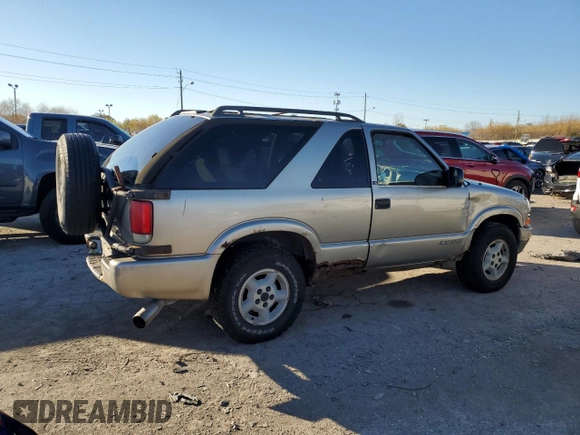 1999 Chevrolet Blazer LS с VIN 1GNCT18W1XK140616, выставлен на аукционе Copart как лот 78567434 с пробегом 244 356 миль миль и Чистый • Clean title. История ставок и продаж доступна на DreamBid. Изображение 3.