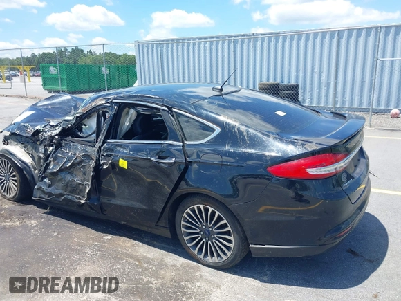 2018 Ford Fusion Titanium with VIN 3FA6P0RU8JR101306, listed as a IAAI auction lot 42542847 with 193,874 mi miles and . Bid and sale history available at DreamBid. Image 3.