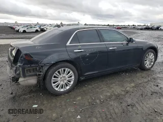 2013 Chrysler 300 C with VIN 2C3CCAKG4DH659709, listed as a Copart auction lot 84390074 with 47,174 mi miles and Salvage Title. Bid and sale history available at DreamBid. Image 3.