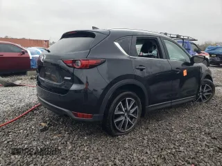 2018 Mazda CX-5 Grand Touring z VIN JM3KFBDM0J0403095, wystawiony jako Copart lot #48594495 z przebiegiem Nie podano mil oraz Szkoda całkowita • Salvage title. Historia ofert i sprzedaży dostępna na DreamBid. Obrazek 3.