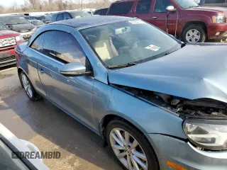 2015 Volkswagen Eos Komfort with VIN WVWBW8AH2FV000829, listed as a Copart auction lot 43082344 with 68,099 mi miles and Salvage Title. Bid and sale history available at DreamBid. Image 4.