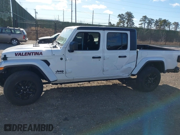 2022 Jeep Gladiator Willys with VIN 1C6HJTAG1NL117631, listed as a IAAI auction lot 41230291 with 33,463 mi miles and . Bid and sale history available at DreamBid. Image 14.