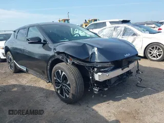 2024 Kia EV6 Wind z VIN KNDC34LA1R5192089, wystawiony jako IAAI lot #42392355 z przebiegiem 15 197 mil mil oraz . Historia ofert i sprzedaży dostępna na DreamBid. Obrazek 1.