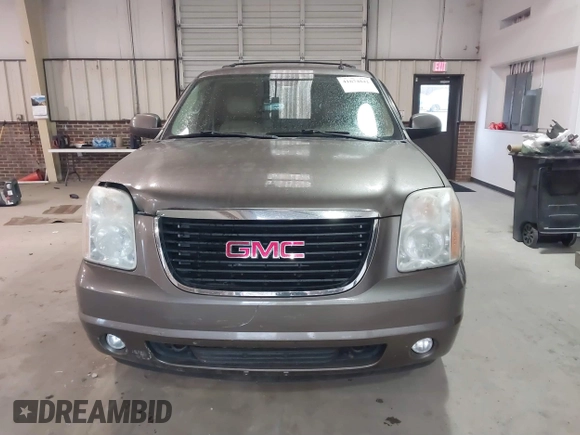 2011 GMC Yukon SLT with VIN 1GKS2CE07BR213141, listed as a IAAI auction lot 41674842 with 226,151 mi miles. Bid and sale history available at carsss.com. Image 12.
