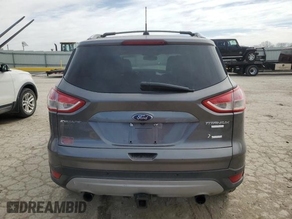 2013 Ford Escape Titanium z VIN 1FMCU9J90DUA72264, wystawiony jako Copart lot #49906445 z przebiegiem 126 527 mil mil oraz Szkoda całkowita • Salvage title. Historia ofert i sprzedaży dostępna na DreamBid. Obrazek 6.
