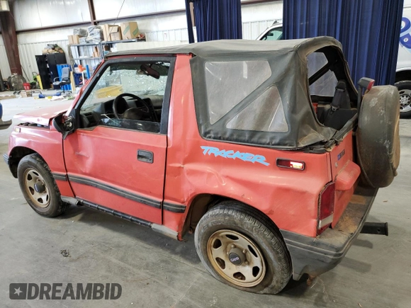 1994 Geo Tracker z VIN 2CNBE18U3R6952403, wystawiony jako Copart lot #79038524 z przebiegiem 271 461 mil mil oraz Szkody całkowita. Historia ofert i sprzedaży dostępna na DreamBid. Obrazek 2.
