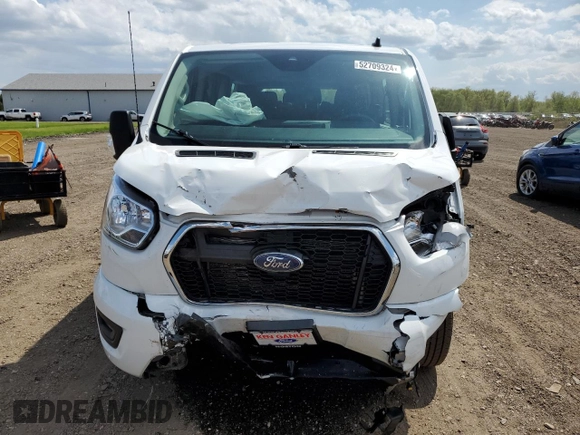 2021 Ford Transit Passenger XL z VIN 1FBAX2Y88MKA30996, wystawiony jako Copart lot #52709324 z przebiegiem 86 753 mil mil oraz Szkoda całkowita • Salvage title. Historia ofert i sprzedaży dostępna na DreamBid. Obrazek 5.