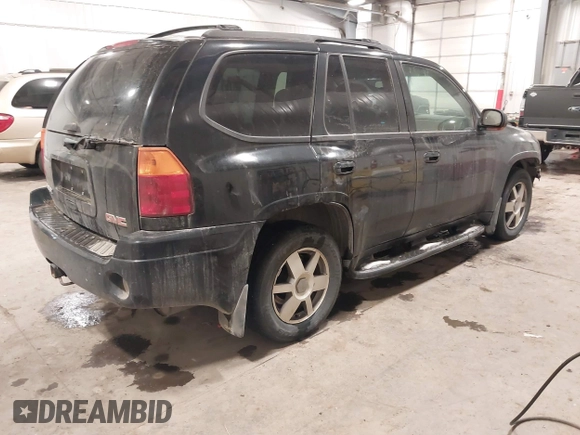 2005 GMC Envoy SLT with VIN 1GKDT13S452349125, listed as a IAAI auction lot 41148381 with 224,049 mi miles. Bid and sale history available at carsss.com. Image 4.