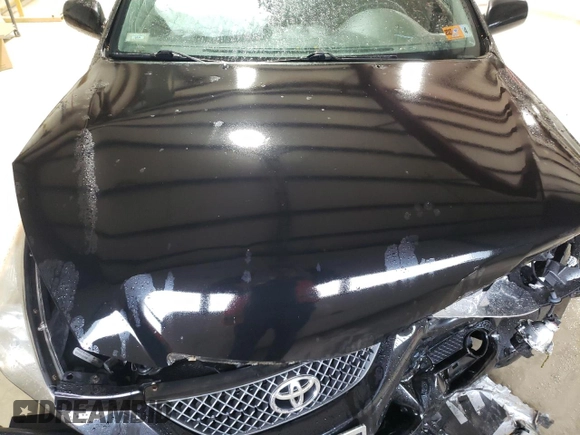 2007 Toyota Solara SE with VIN 4T1CE30PX7U754499, listed as a Copart auction lot 58711125 with 166,200 mi miles and Salvage title. Bid and sale history available at DreamBid. Image 11.