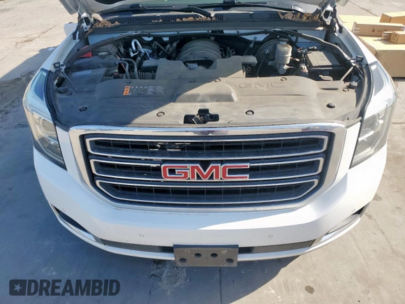 2019 GMC Yukon XL SLT with VIN 1GKS2GKC5KR363643, listed as a Copart auction lot 52749525 with 92,872 mi miles and Salvage title. Bid and sale history available at DreamBid. Image 12.