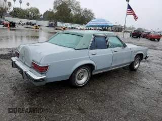 1977 Lincoln Continental with VIN 7W84F813150, listed as a Copart auction lot 45213895 with 91,794 mi miles and Salvage Title. Bid and sale history available at DreamBid. Image 3.