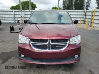 2019 Dodge Grand Caravan SXT with VIN 2C4RDGCGXKR807759, listed as a Copart auction lot 56098575 with 119,268 mi miles and Salvage Title. Bid and sale history available at DreamBid. Image 5.