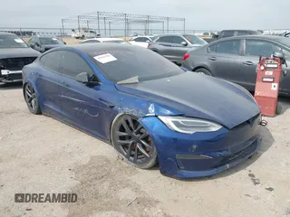 2021 Tesla Model S Plaid with VIN 5YJSA1E64MF442036, listed as a IAAI auction lot 42141304 with 24,998 mi miles and . Bid and sale history available at DreamBid. Image 1.