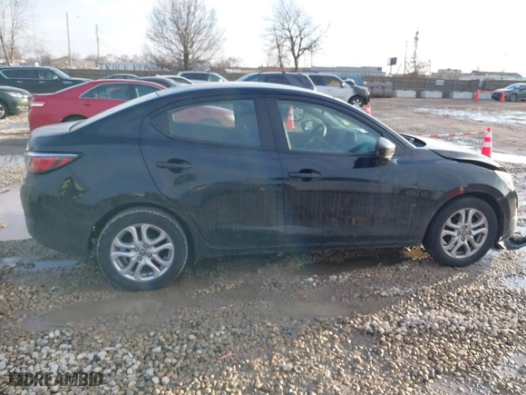 2017 Toyota Yaris iA with VIN 3MYDLBYVXHY185262, listed as a IAAI auction lot 41658750 with 91,326 mi miles. Bid and sale history available at carsss.com. Image 13.