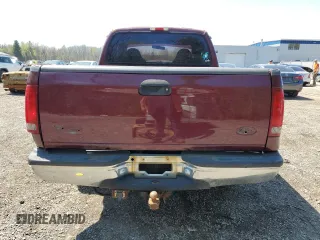 2000 Ford F-250 XL with VIN 1FTNX20F5YED86494, listed as a Copart auction lot 54193495 with 551,488 mi miles and Salvage title. Bid and sale history available at DreamBid. Image 6.