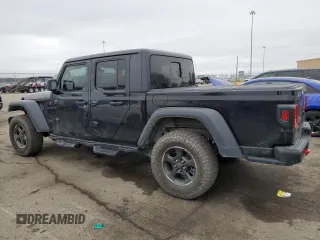 2023 Jeep Gladiator Rubicon with VIN 1C6JJTBG6PL500516, listed as a Copart auction lot 43432015 with 107,096 mi miles and Salvage title. Bid and sale history available at DreamBid. Image 2.