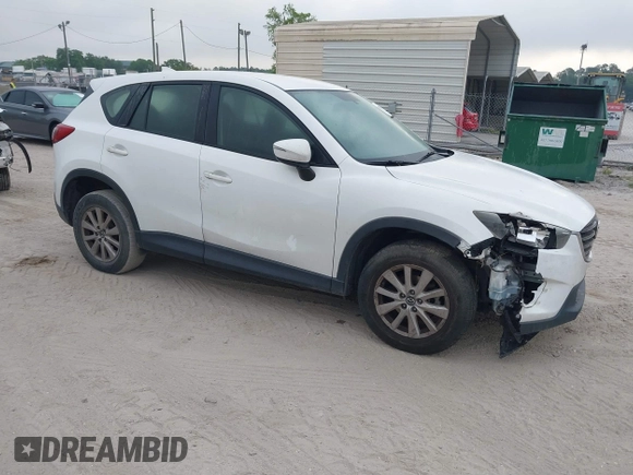 2016 Mazda CX-5 Sport with VIN JM3KE2BY1G0875484, listed as a IAAI auction lot 41838122 with 166,986 mi miles. Bid and sale history available at carsss.com. Image 1.