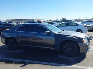 2014 Chrysler 300 with VIN 2C3CCAAG1EH191375, listed as a IAAI auction lot 41867688 with 218,740 mi miles. Bid and sale history available at carsss.com. Image 13.
