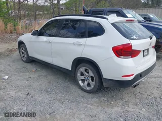 2013 BMW X1 28i with VIN WBAVM1C59DVW44965, listed as a IAAI auction lot 41951047 with 122,191 mi miles. Bid and sale history available at carsss.com. Image 3.