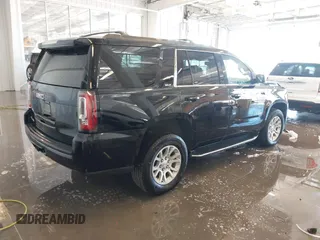 2020 GMC Yukon SLT with VIN 1GKS2BKC6LR232354, listed as a IAAI auction lot 41313325 with 107,960 mi miles. Bid and sale history available at carsss.com. Image 4.