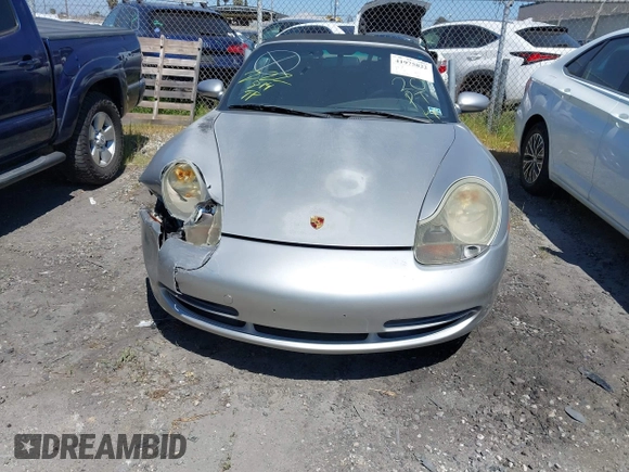 1999 Porsche 911 with VIN WP0CA2999XS652816, listed as a IAAI auction lot 41975822 with 291,258 mi miles and . Bid and sale history available at DreamBid. Image 12.