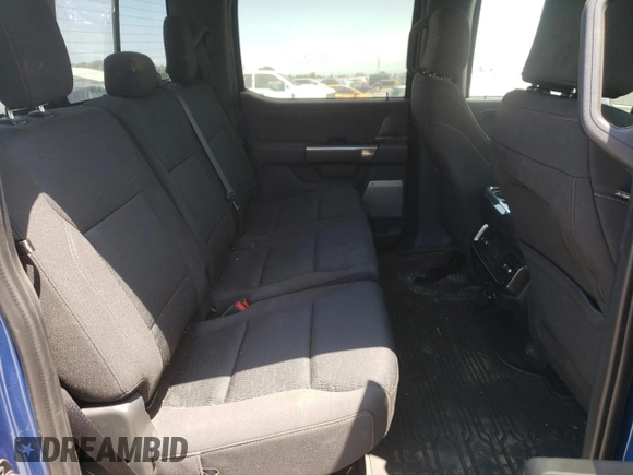 2023 Ford F-150 XL with VIN 1FTFW1E8XPKE23518, listed as a Copart auction lot 60340975 with 11,661 mi miles and Salvage title. Bid and sale history available at DreamBid. Image 10.