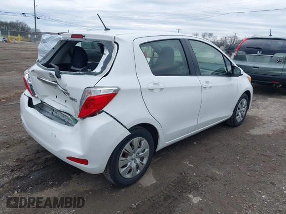2014 Toyota Yaris L with VIN JTDKTUD34ED589582, listed as a IAAI auction lot 41538884 with 87,798 mi miles. Bid and sale history available at carsss.com. Image 4.
