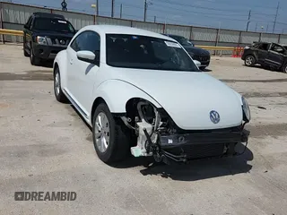 2019 Volkswagen Beetle S с VIN 3VWFD7AT0KM714028, выставлен на аукционе Copart как лот 59209825 с пробегом 180 489 миль миль и Списание • Salvage title. История ставок и продаж доступна на DreamBid. Изображение 13.