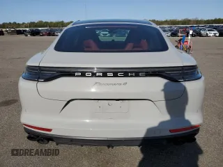 2023 Porsche Panamera z VIN WP0AJ2A79PL101328, wystawiony jako Copart lot #55093015 z przebiegiem 26 927 mil mil oraz Szkody całkowita. Historia ofert i sprzedaży dostępna na DreamBid. Obrazek 6.
