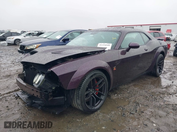2021 Dodge Challenger R/T Scat Pack z VIN 2C3CDZFJ2MH586535, wystawiony jako IAAI lot #41224949 z przebiegiem 32 977 mil mil oraz . Historia ofert i sprzedaży dostępna na DreamBid. Obrazek 18.