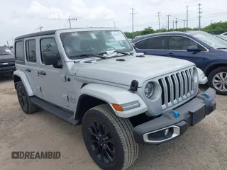 2023 Jeep Wrangler Sahara with VIN 1C4JJXP62PW627455, listed as a IAAI auction lot 42115137 with 62,143 mi miles and . Bid and sale history available at carsss.com. Image 6.