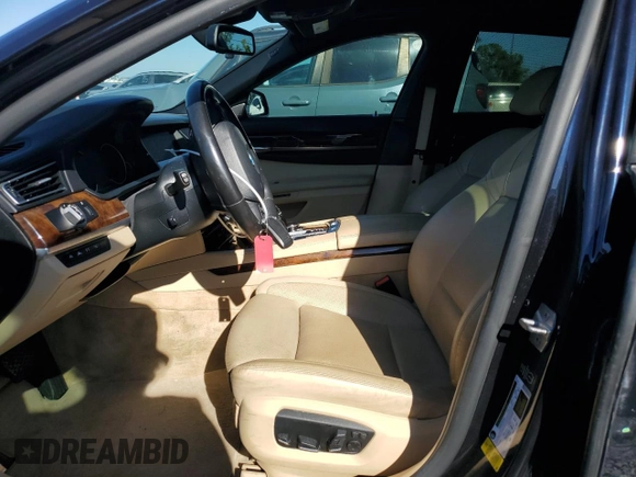 2015 BMW 7 Series 750Li with VIN WBAYE8C51FD781006, listed as a Copart auction lot 48202715 with 50,601 mi miles and Salvage Title. Bid and sale history available at carsss.com. Image 7.