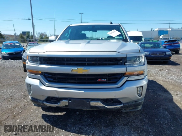 2018 Chevrolet Silverado 1500 LT with VIN 1GCVKREC8JZ237565, listed as a IAAI auction lot 42052619 with 92,790 mi miles and . Bid and sale history available at DreamBid. Image 12.