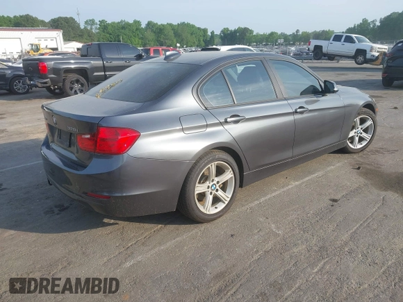 2013 BMW 3 Series 328i xDrive with VIN WBA3B3C53DJ810249, listed as a IAAI auction lot 42099473 with 125,255 mi miles. Bid and sale history available at carsss.com. Image 4.